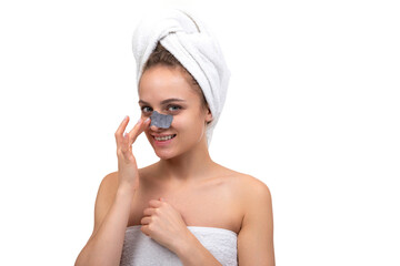 woman after shower with a mask for cleansing pores on the nose