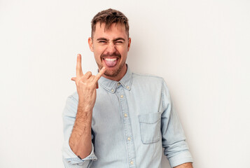 Naklejka premium Young caucasian man isolated on white background dancing and having fun.
