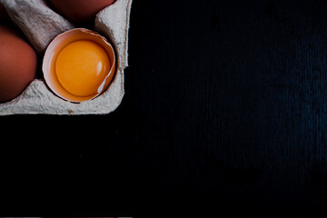 egg yolk in a cup - obrazy, fototapety, plakaty