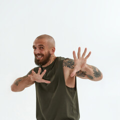 Young smiling cool man gesticulating with hands