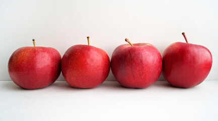 red apples on white background