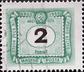 HUNGARY - CIRCA 1953: A post stamp printed in Hungary showing a number 2 and an ornamental border