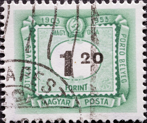 HUNGARY - CIRCA 1953: A post stamp printed in Hungary showing a number 1,20  and an ornamental...