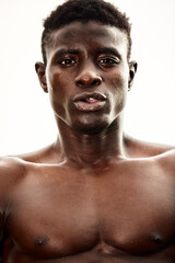 Portrait of topless Afro-American sportsman ready to training.