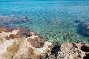 Obraz premium Rocks and Blue Water. Salento, South Italy