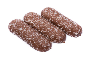 Group of long chocolate bars with coconut powder