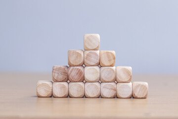 empty wooden cube on wood bacground, copy space