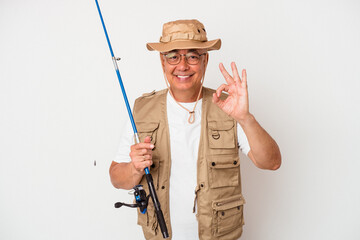 Senior american fisherman holding rod isolated on white background cheerful and confident showing ok gesture.