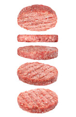 Fresh raw burger patties and falling on white background