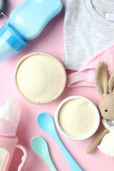 Concept of baby food with рowdered milk on pink background