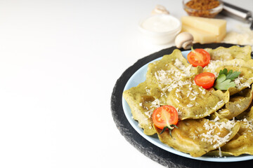 Delicious food concept with ravioli on white background