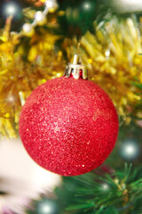 Round shiny toy balls on a Christmas tree