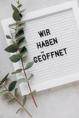 Door sign Wir Haben Geöffnet - We Are Open in German language for small business owners and shops....