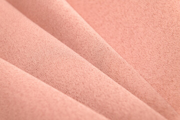 Fototapeta premium Background, texture. Template. Satin cloth for wedding and evening dresses. A nude shade.