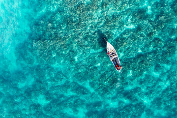 Aerial view, fishermen catch fish on the reefs at Cap Malheureux, Grand Gaube, Pamplemousses...