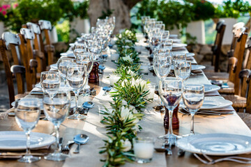 Served and decorated table for celebration outside.  Celebration dinner concept.