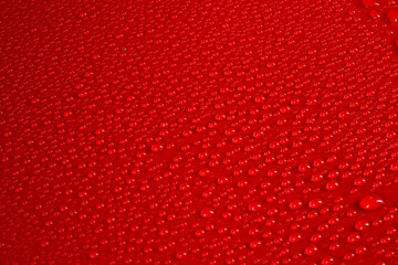 Abstract background, water droplets on red