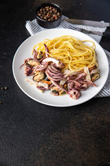 seafood pasta spaghetti sea delicacies meal snack on the table copy space food background rustic. top view