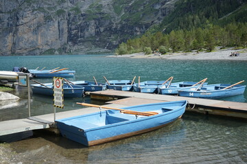 rowing boats waiting at shore