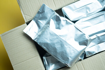 Bags plastic or foil vacuum sealed coffee in stock for coffee shop
