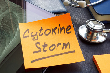 Cytokine storm memo sticker on the hospital table.