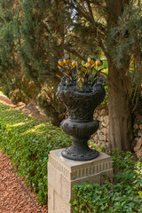 A decorative vessel on a pedestal in the Bahai Garden, located on Mount Carmel in the city of Haifa, in northern Israel