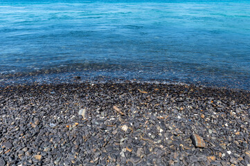 Beautiful black stone beach or Koh Hin Ngam in tropical sea at Lipe island