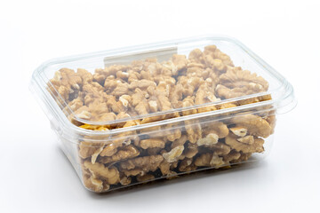 Packed walnut kernel isolated on white background. Snack nuts. close-up.