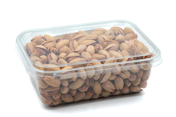 Packed pistachios isolated on white background. Snack nuts. close-up.