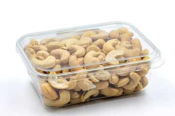 Packed cashews isolated on white background. Snack nuts. close-up.
