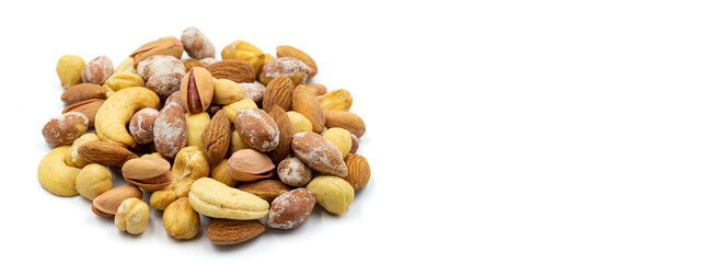 Mixed nuts isolated on white background. Snack fresh nuts. close up. Empty space for text. Copy space