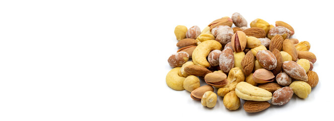 Mixed nuts isolated on white background. Snack fresh nuts. close up. Empty space for text. Copy space