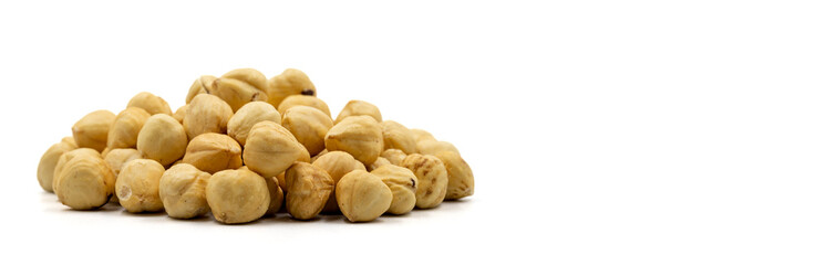 Fototapeta premium Hazelnut kernel isolated on white background. Snack fresh Peeled hazelnuts. close up. Empty space for text. Copy space