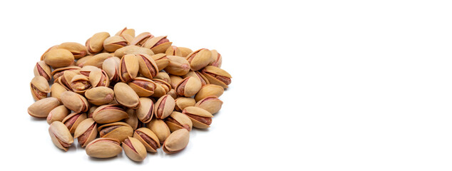 Pistachios isolated on white background. Snack fresh nuts. close up. Empty space for text. Copy space