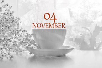 calendar date on light background with porcelain white tea pair and white gypsophila with copy space. November 4 is the fourth day of the month