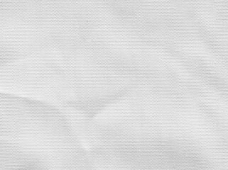 Crumpled white fabric texture background.