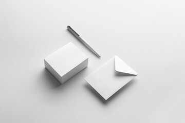 Minimalistic branding stationery mockup template, real photo, letterhead, flyer, poster, business card, envelope identity. Blank isolated on a white background to place your design. 