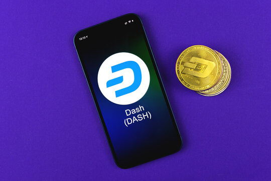 DASH symbol. Trade with cryptocurrency, digital and virtual money, banking with mobile phone concept. Business workspace, table top view photo