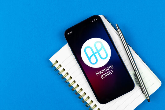 Harmony ONE symbol. Trade with cryptocurrency, digital and virtual money, banking with mobile phone concept. Business workspace, table top view photo