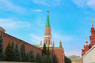 Fototapeta premium Nikolskaya tower of the Moscow Kremlin against the background of a cloudy sky. Red square in Moscow