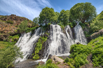 Fototapeta na wymiar Majestic Shaki Waterfall in Syunik province in Armenia. Peaceful scenery and outdoor journey concept