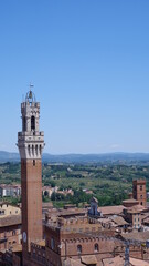 Fototapeta premium Bell tower of the Palazzo Pubblico, at the Piazzo del Campo, Siena, Italy. 