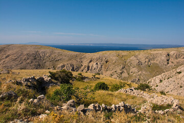 Fototapeta na wymiar The rugged late summer landscape near Stara Baska on the Croatian island of Krk 