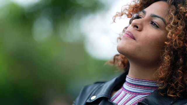 Black woman pondering solution to problem. Brazilian girl thinking contemplating solution