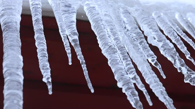 icicles hanging from a roof winter russian day