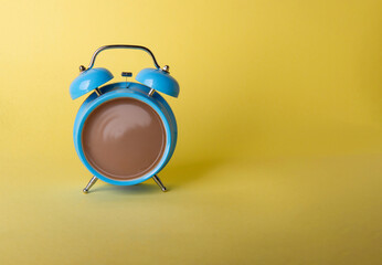 Alarm clock and coffee concept illustration isolated on yellow background. Morning with coffee and coffee time concept