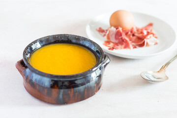 Pumpkin cream with egg and ham
