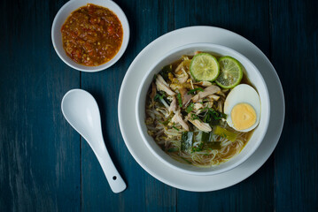 Chicken Soto or Soto Ayam in Indonesia. Soto ayam is a traditional Indonesian dish which uses ingredients such as chicken, vermicelli, bean sprout with turmeric as main ingredient add in the broth.