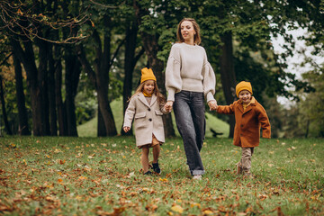 Mother with kids having fun in park