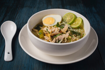 Chicken Soto or Soto Ayam in Indonesia. Soto ayam is a traditional Indonesian dish which uses ingredients such as chicken, vermicelli, bean sprout with turmeric as main ingredient add in the broth.
